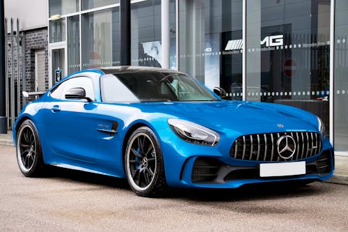 A Modern Blue Mercedes-AMG GT R Parked in front of the Car Salon 