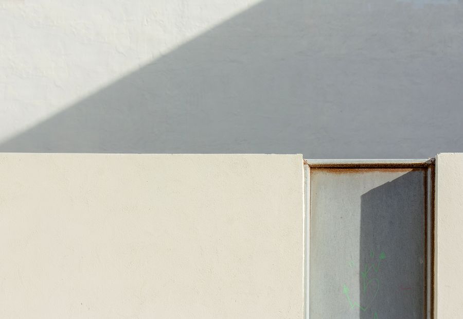 Geometric architecture with strong shadows and sunlight