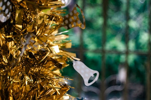 Gold Tinsel Decor With White Flower Ornament