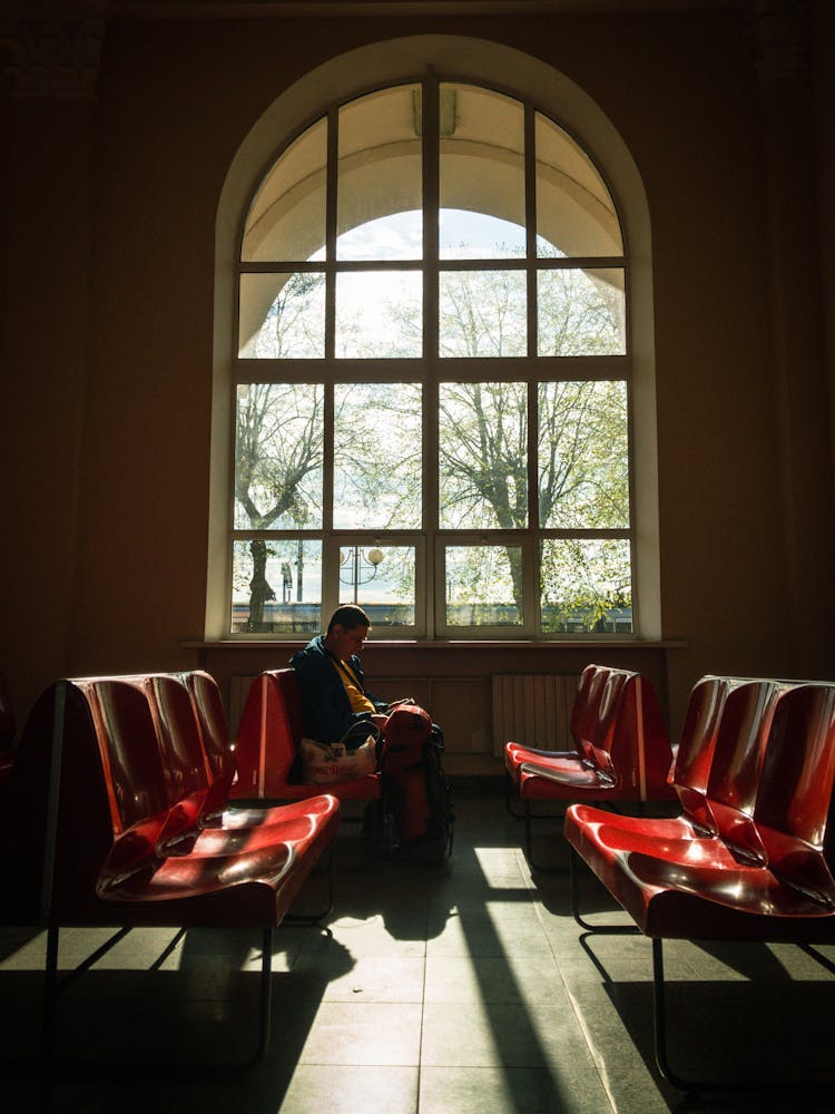 Man Waiting In Lounge