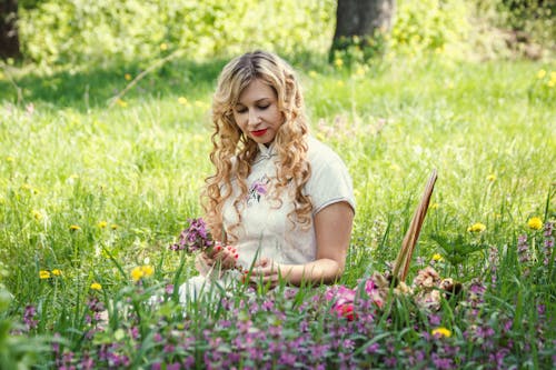 Free Woman Holding Flowers Stock Photo