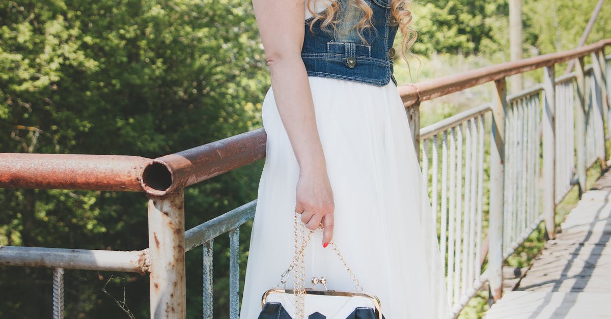 Woman in Denim and White Dress