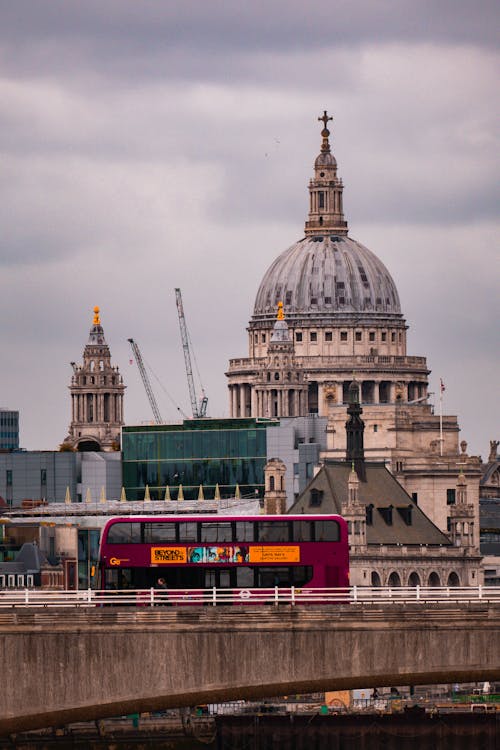 Double-Decker Bus on Bridge by St Pauls Cathedral in London, England