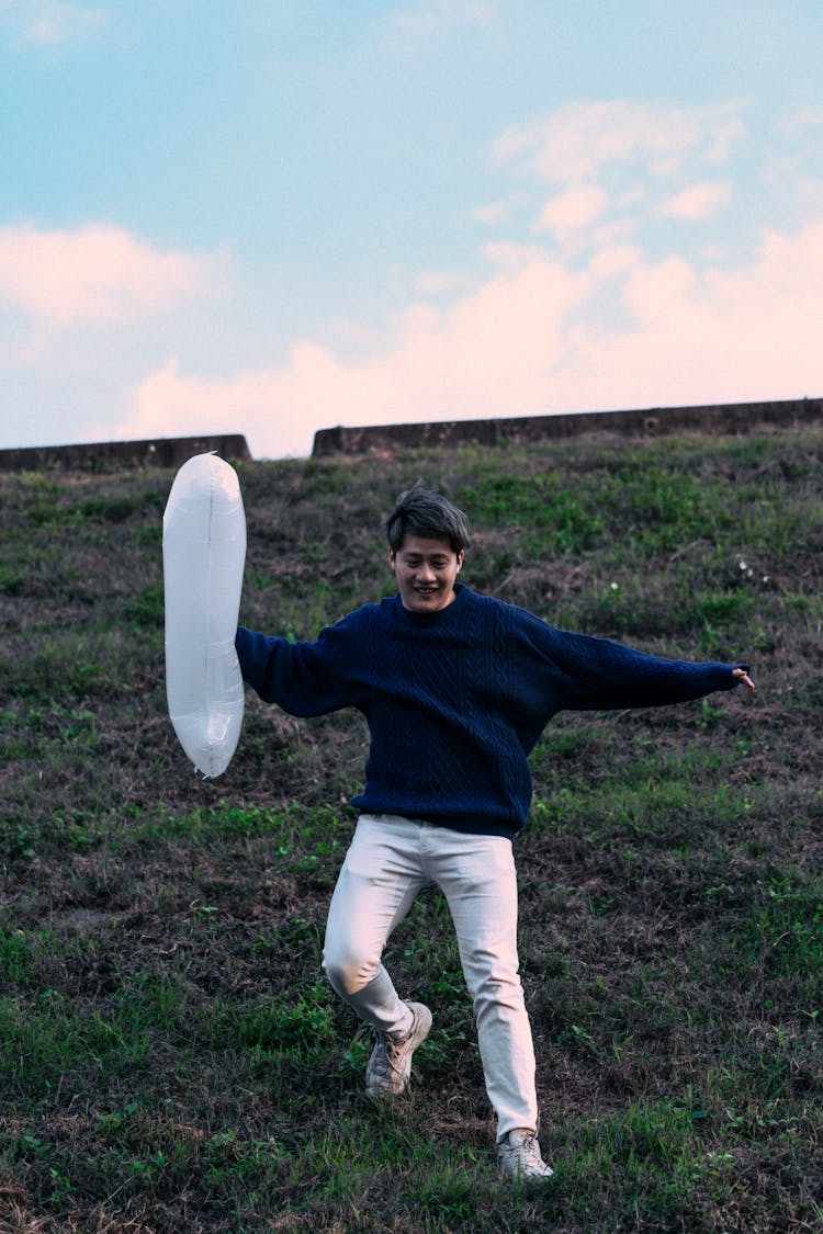 Smiling Person With Balloon