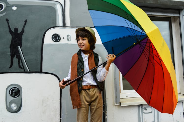 Boy Holding Umbrella