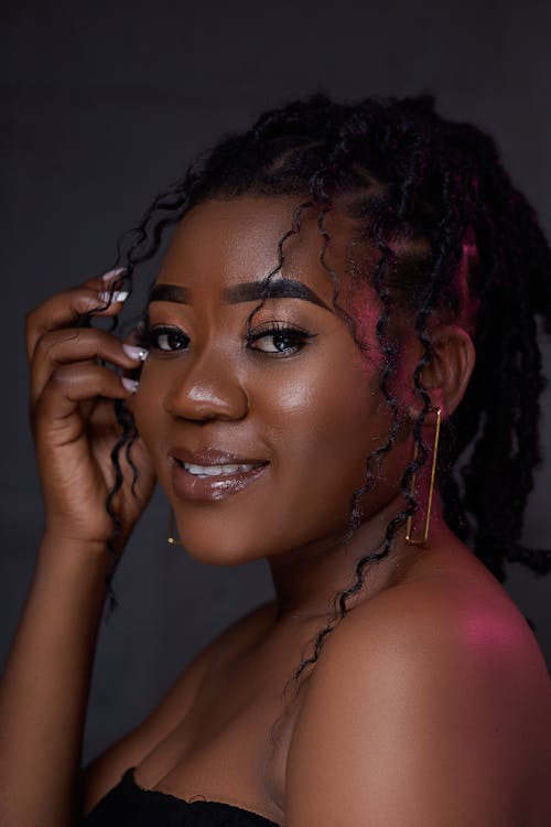 Smiling Woman with Braided Hair