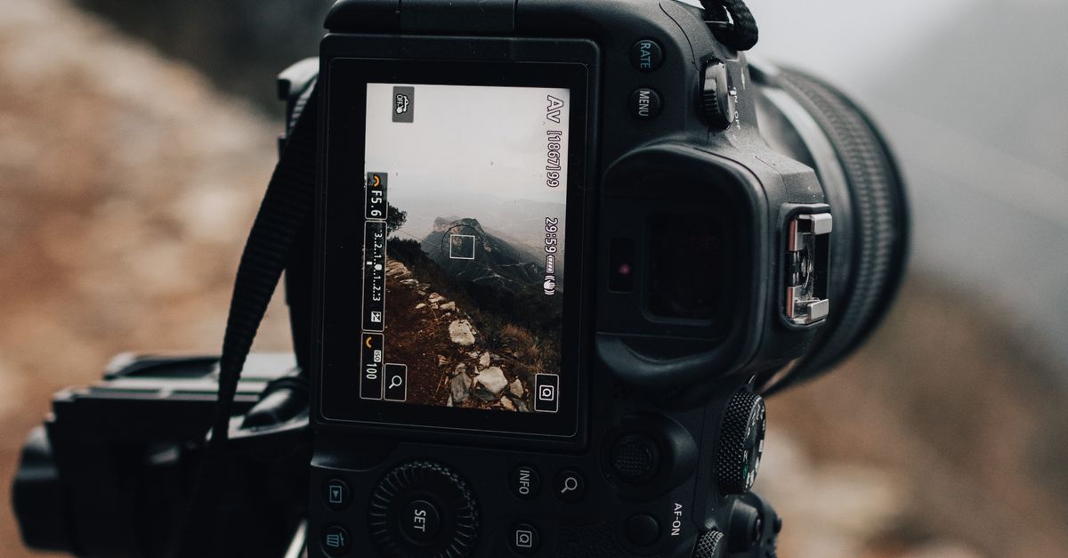 Capturing Camera Camera Capturing a Landscape · Free Stock Photo