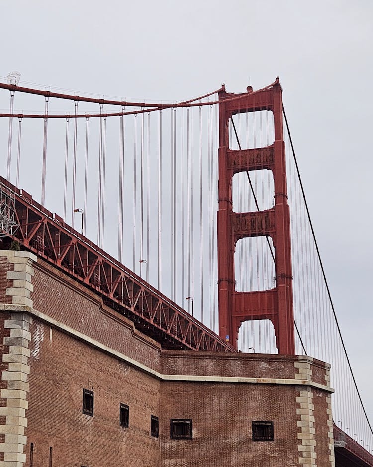 Low Angle Shot Of The Fort Point National Historic Site With The Golden Bridge In The Background, San Francisco 