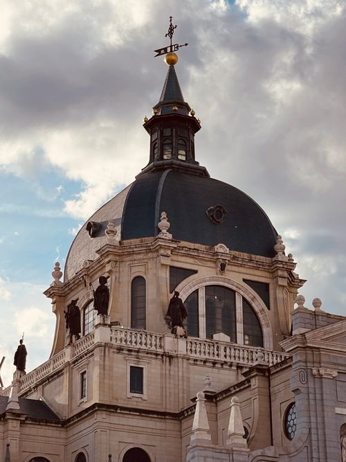 Free Stunning view of the Almudena Cathedral dome showcasing neoclassical architecture in Madrid. Stock Photo