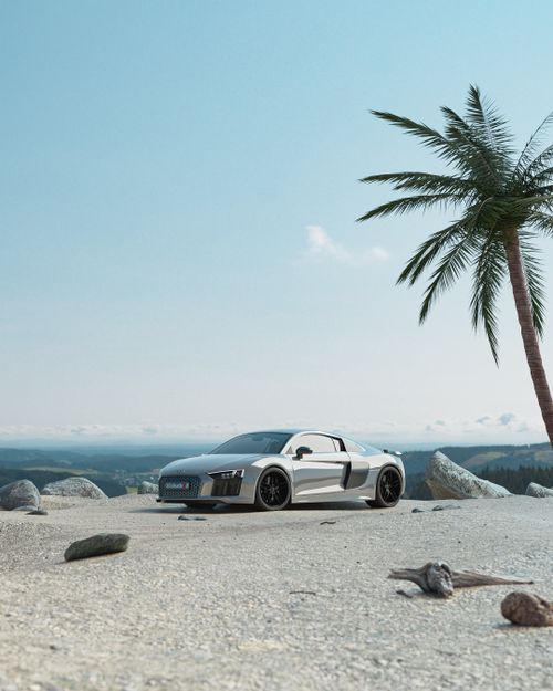 Free Elegant silver sports car parked near palm trees at a scenic overlook in Erbil, Kurdistan. Stock Photo