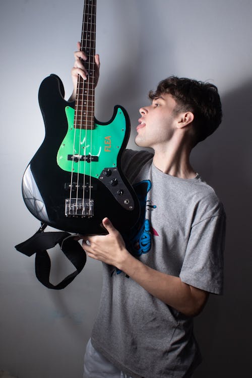 Man Posing with Electric Guitar