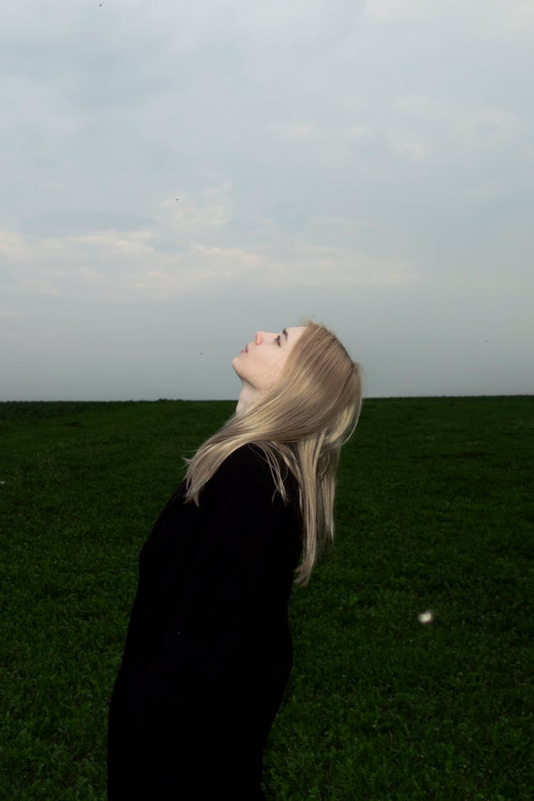 Young Blondes Facial Profile Against Symmetric Background