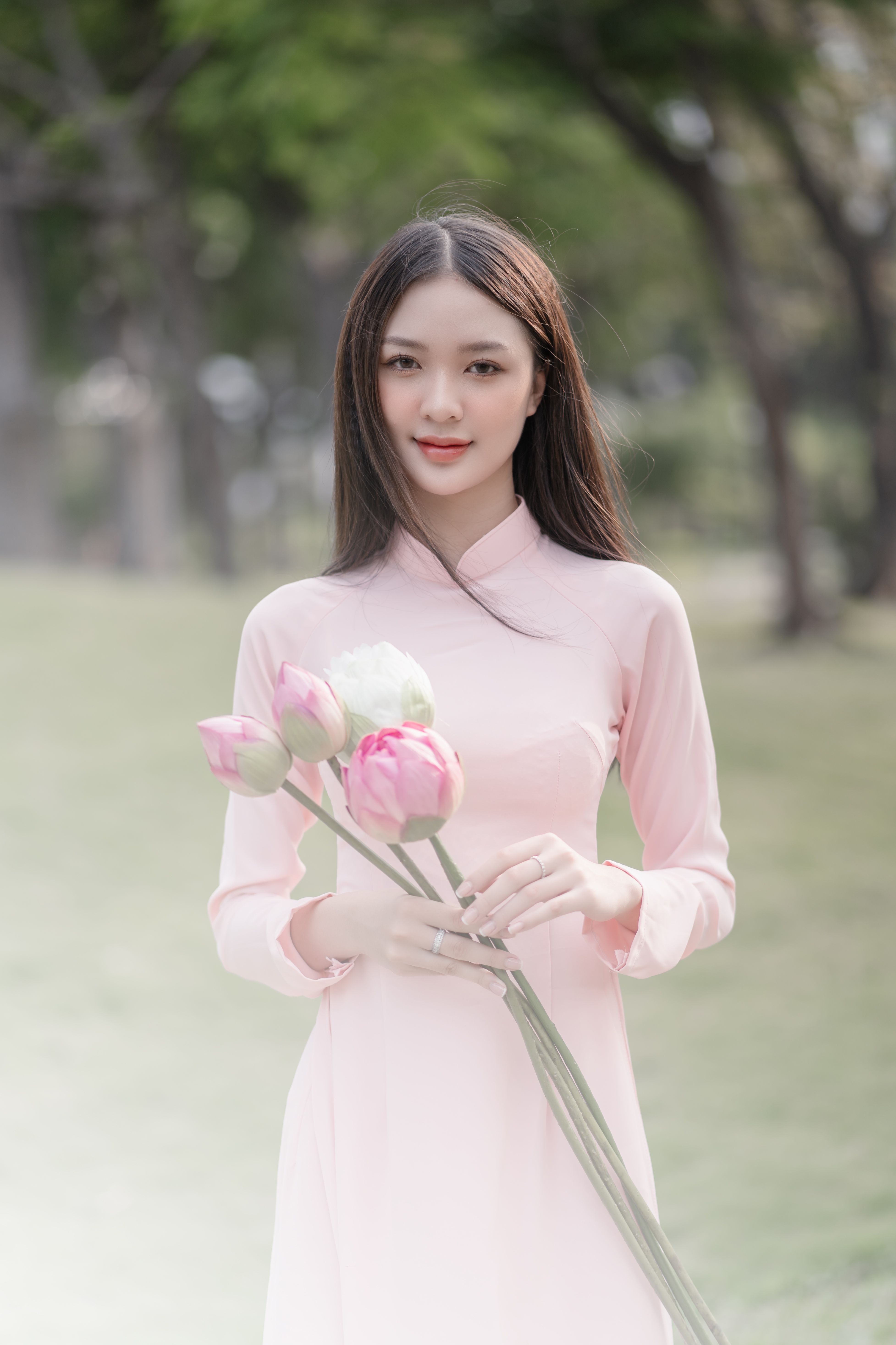 Woman Posing in Pink Dress and with Flowers · Free Stock Photo