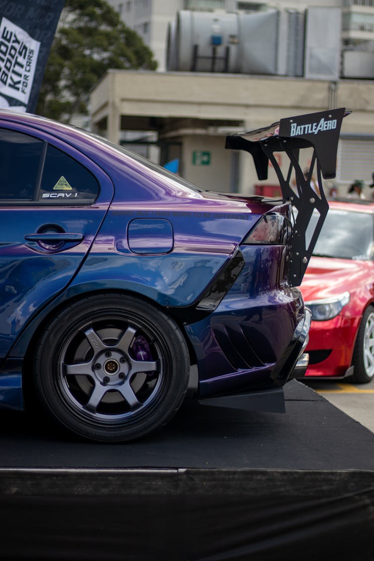 Blue Mitsubishi Lancer Evolution With Black Spoiler