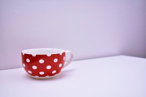 White and Red Ceramic Cup