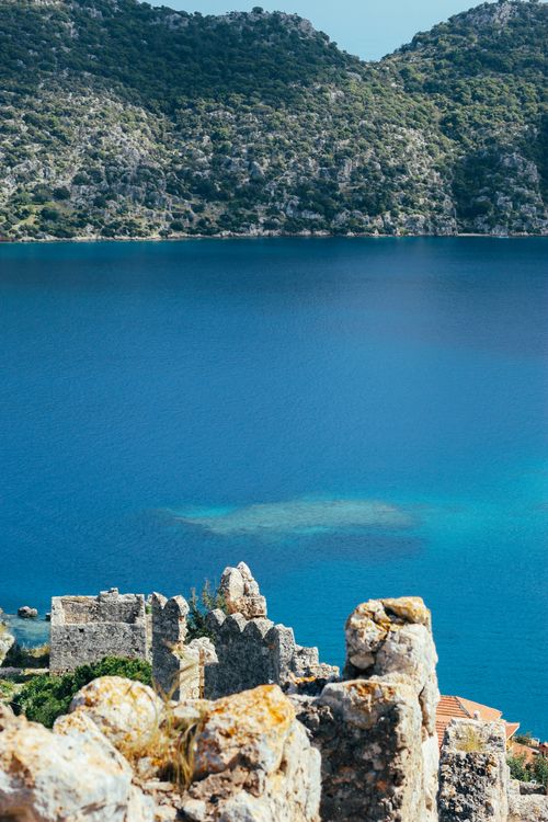 Free Explore the breathtaking seascape and ancient ruins in Antalya, Türkiye, with vibrant blue waters. Stock Photo