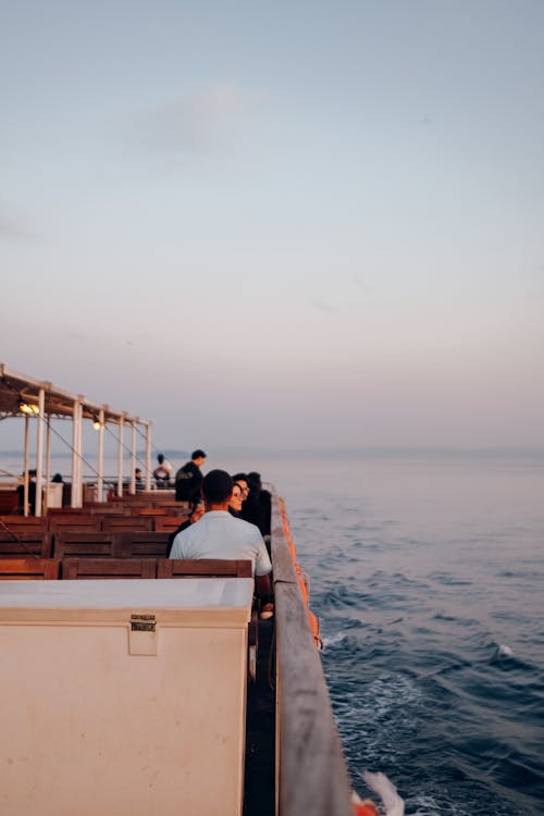 People on a Boat at Sunset 