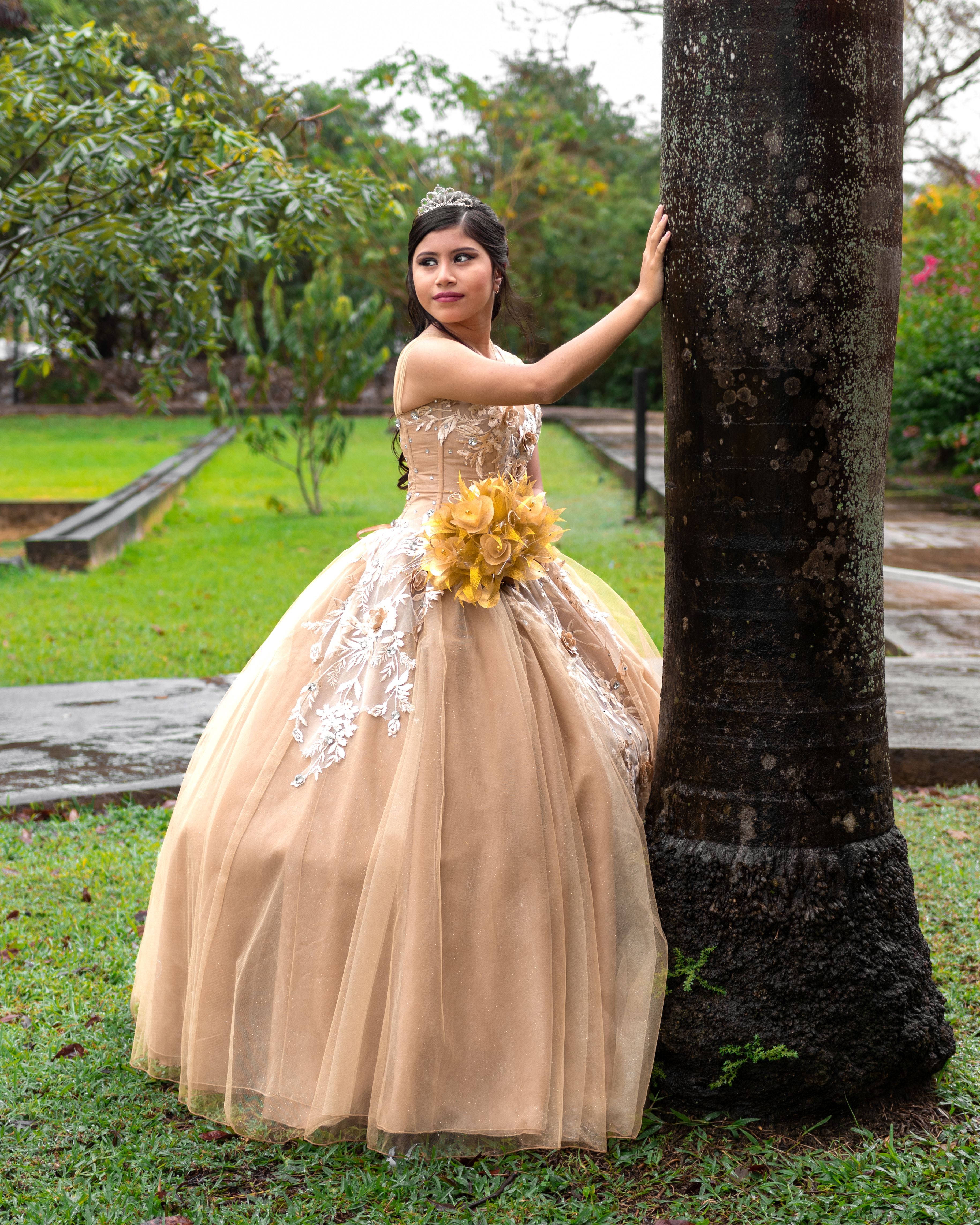 Woman in Dress and with Flowers at Park · Free Stock Photo