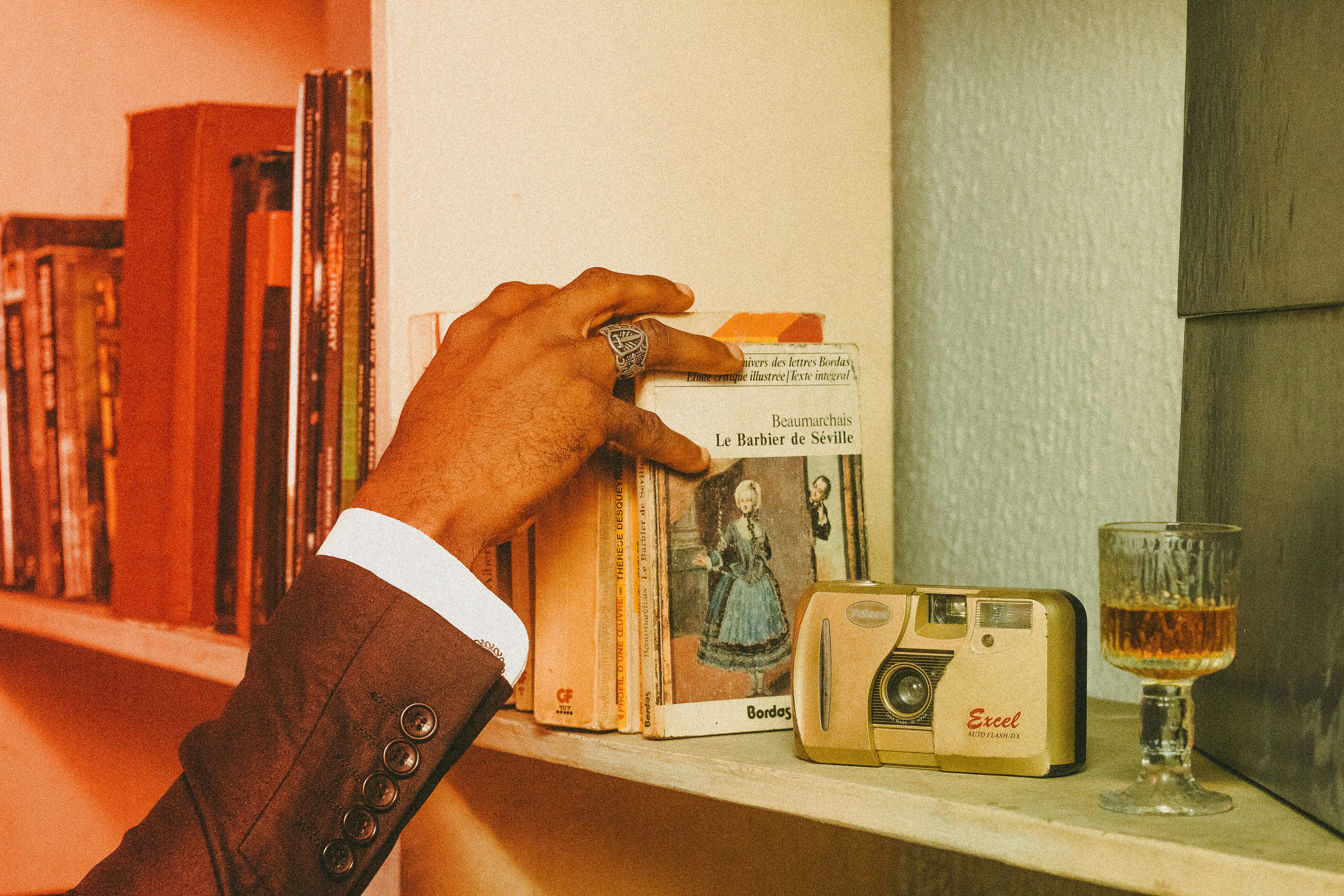 hand reaching for book