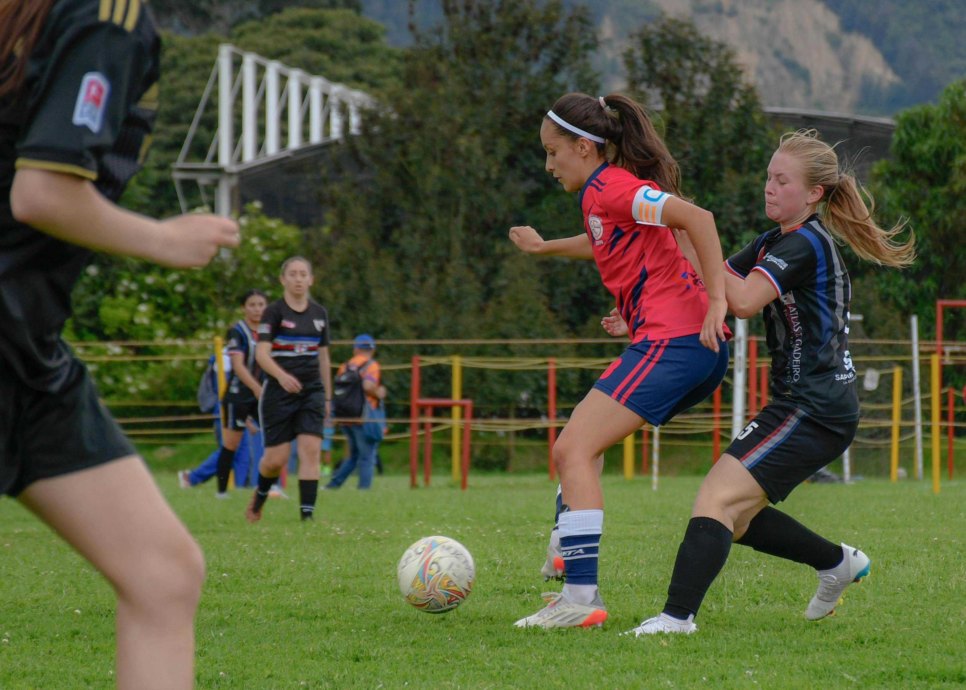 Girls store playing soccer