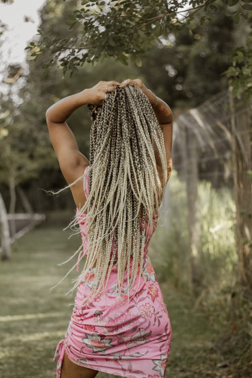 Woman with Dyed, Blonde Dreadlocks