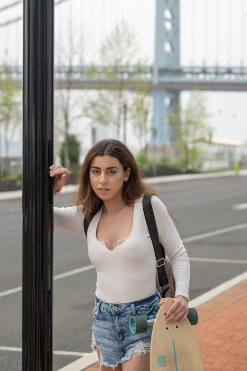 Woman Posing by Street in City