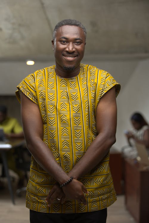 Smiling Man in Traditional Clothing