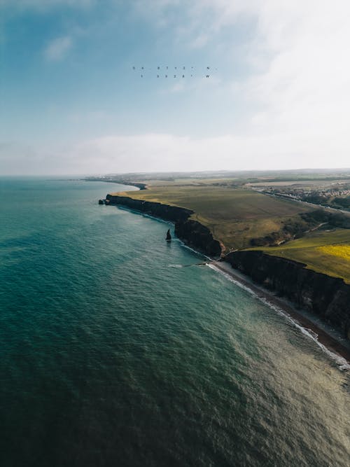 Darmowe zdjęcie z galerii z fotografia lotnicza, linia brzegowa, morze