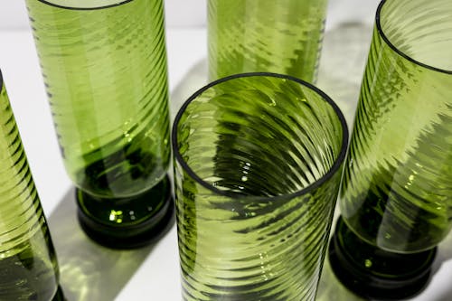 A set of six green glass tumblers