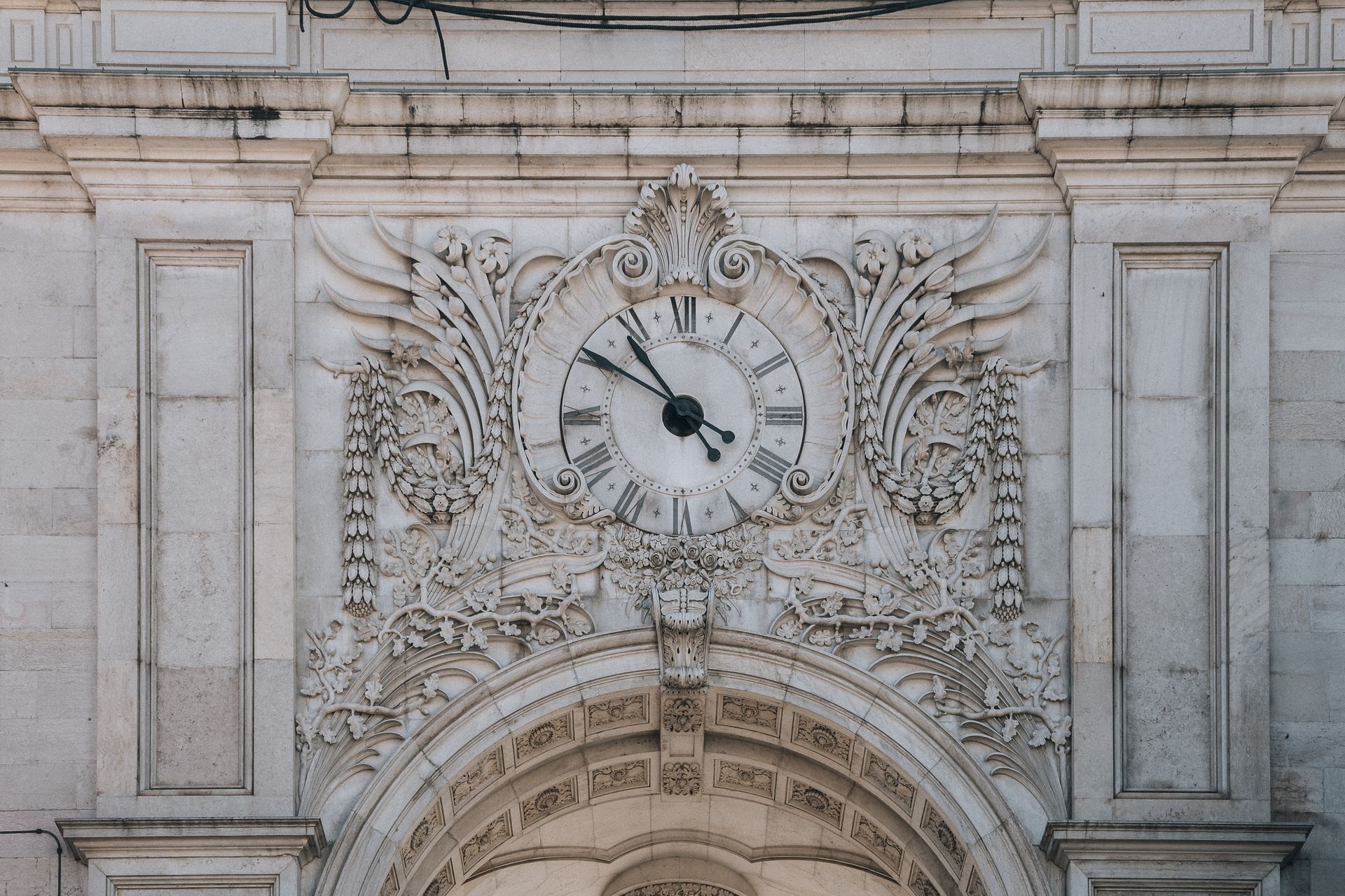 Clock on Rua Augusta Arch in Lisbon