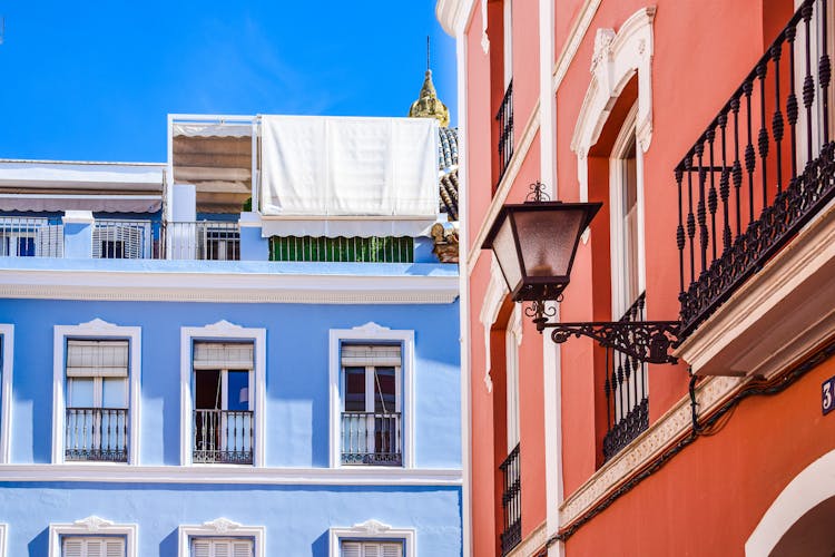 Red And Blue Buildings Walls In Town