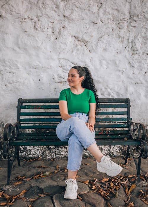 Smiling Woman on Green Branch