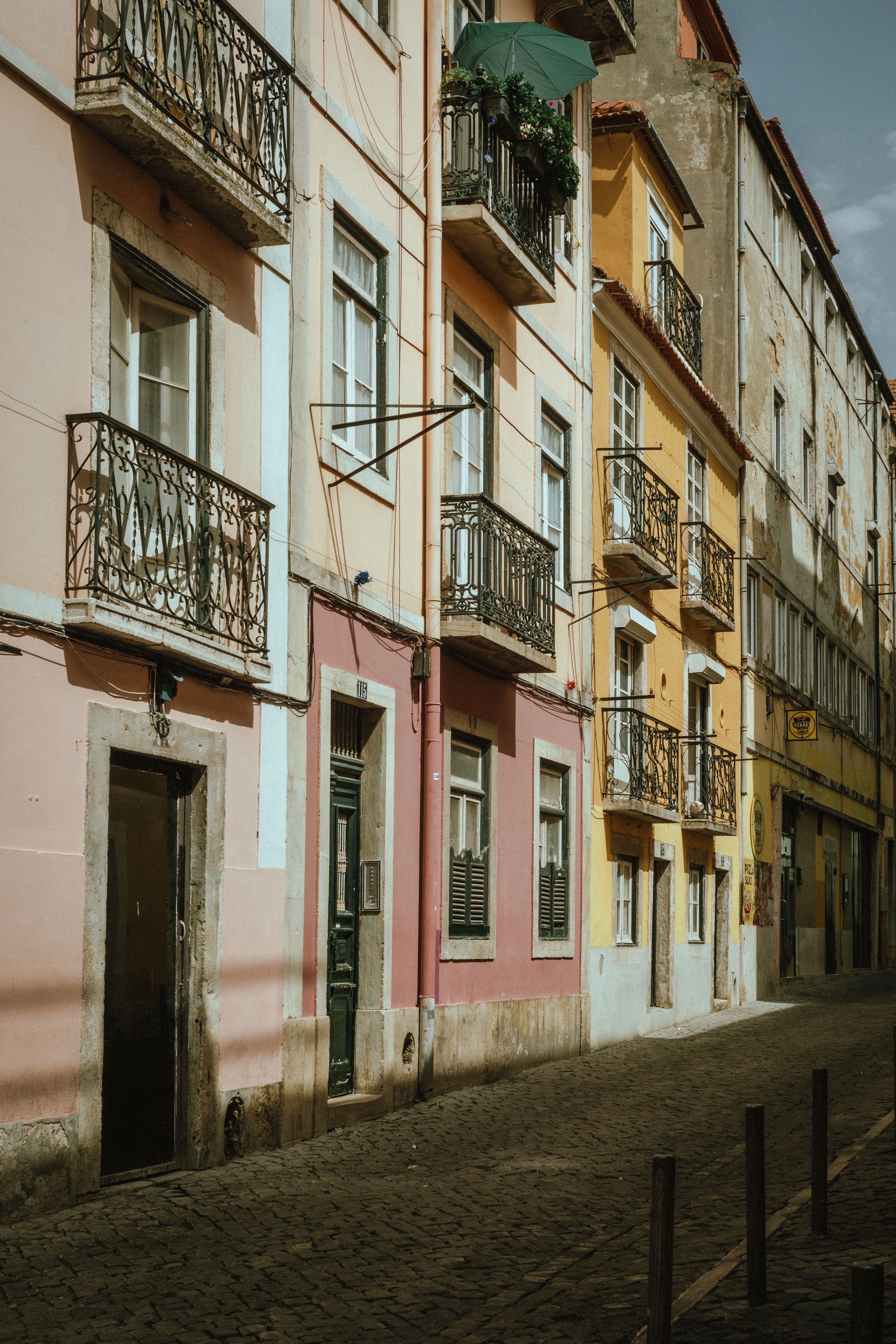 Buildings by Street in Lisbon · Free Stock Photo