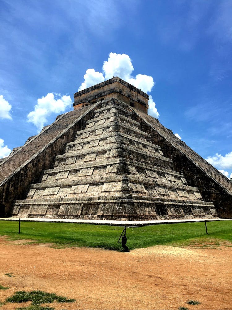 Sunlit El Castillo Pyramid In Mexico