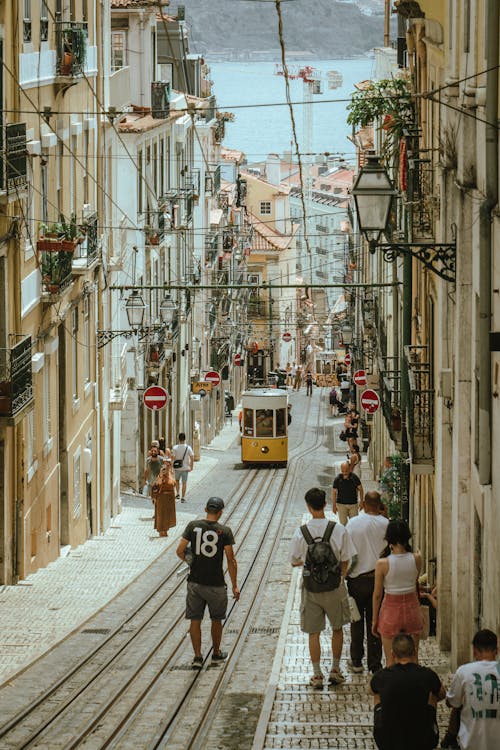 People on Steep Street in Lisbon