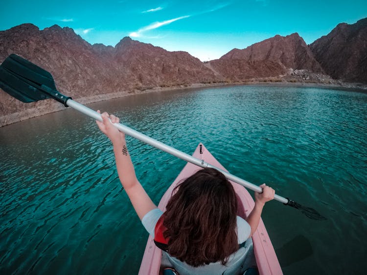 Woman Using Paddle