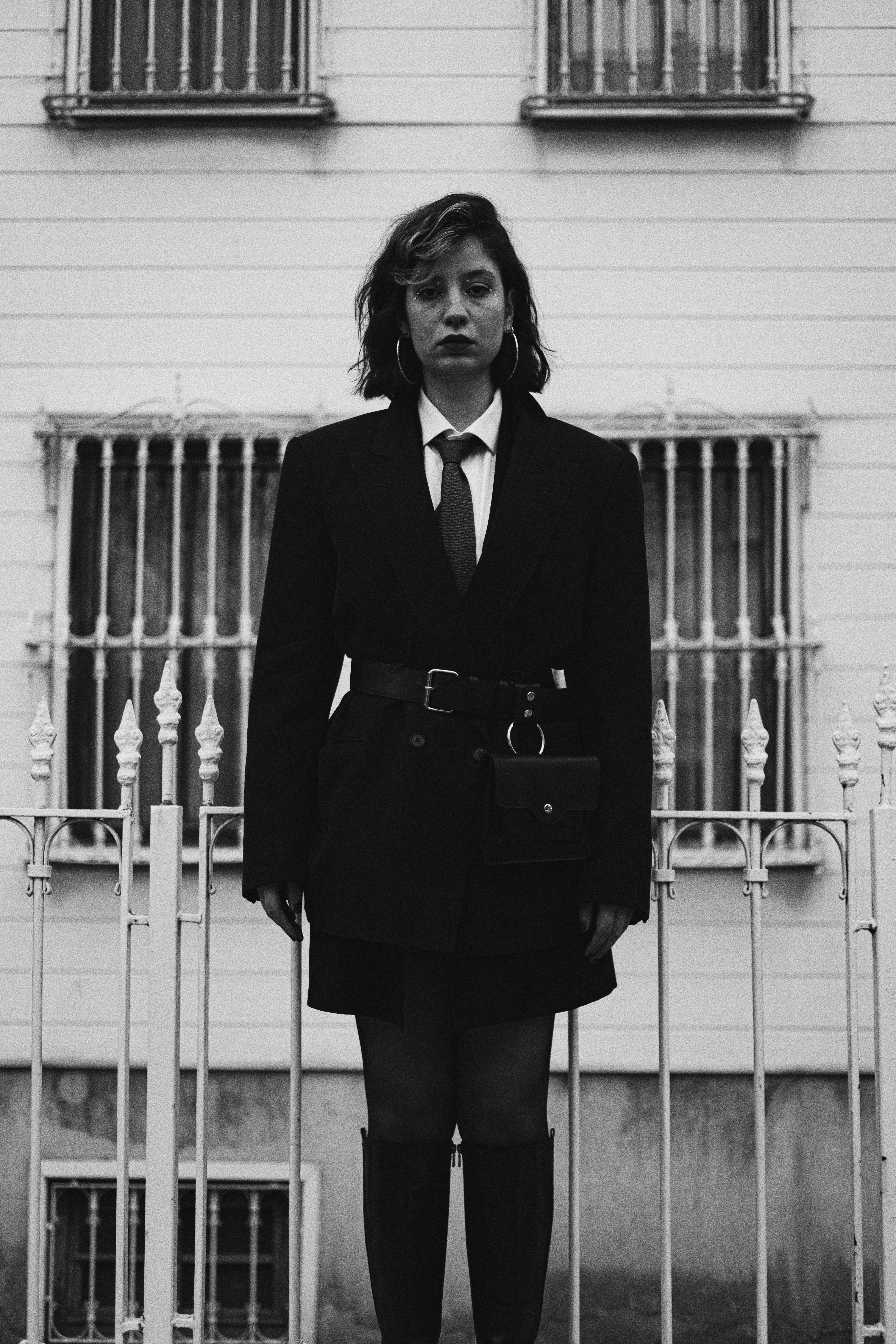 Female Model Standing in Front of a Fence · Free Stock Photo