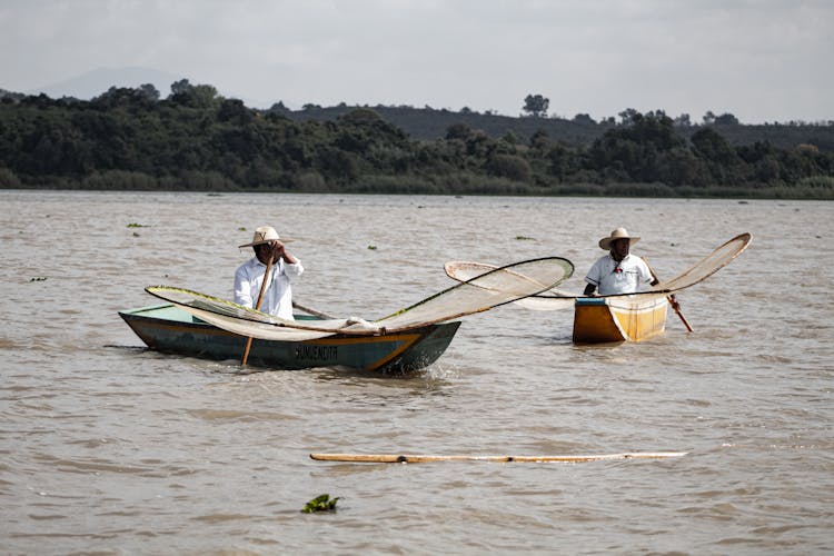 Fishermen On Boats