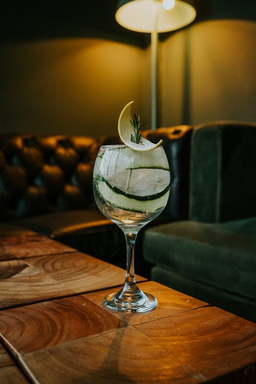 Close-up of a Glass with a Cold Cocktail Standing on a Table 