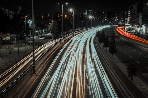 Vehicle Light Trails on a City Highway at Night