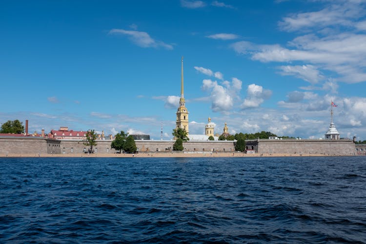 Tower Of Peter And Paul Cathedral Behind Neva River In St Petersburg