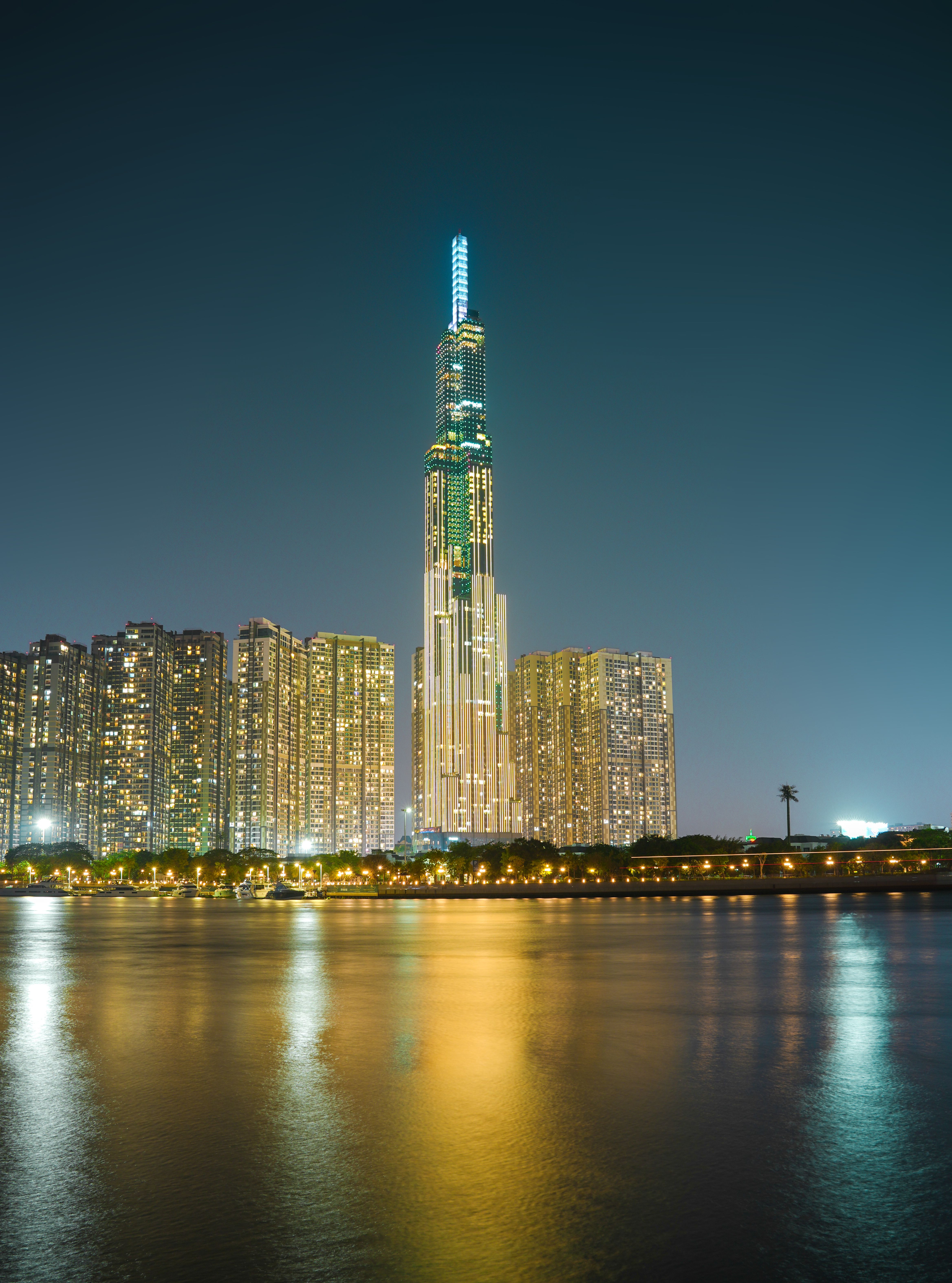 Landmark 81 over Buildings in Ho Chi Minh at Night · Free Stock Photo