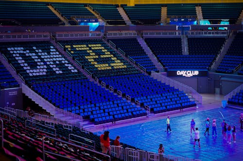 People Preparing for the Performance in an Empty Pauley Pavilion in UCLA, Los Angeles, California, USA