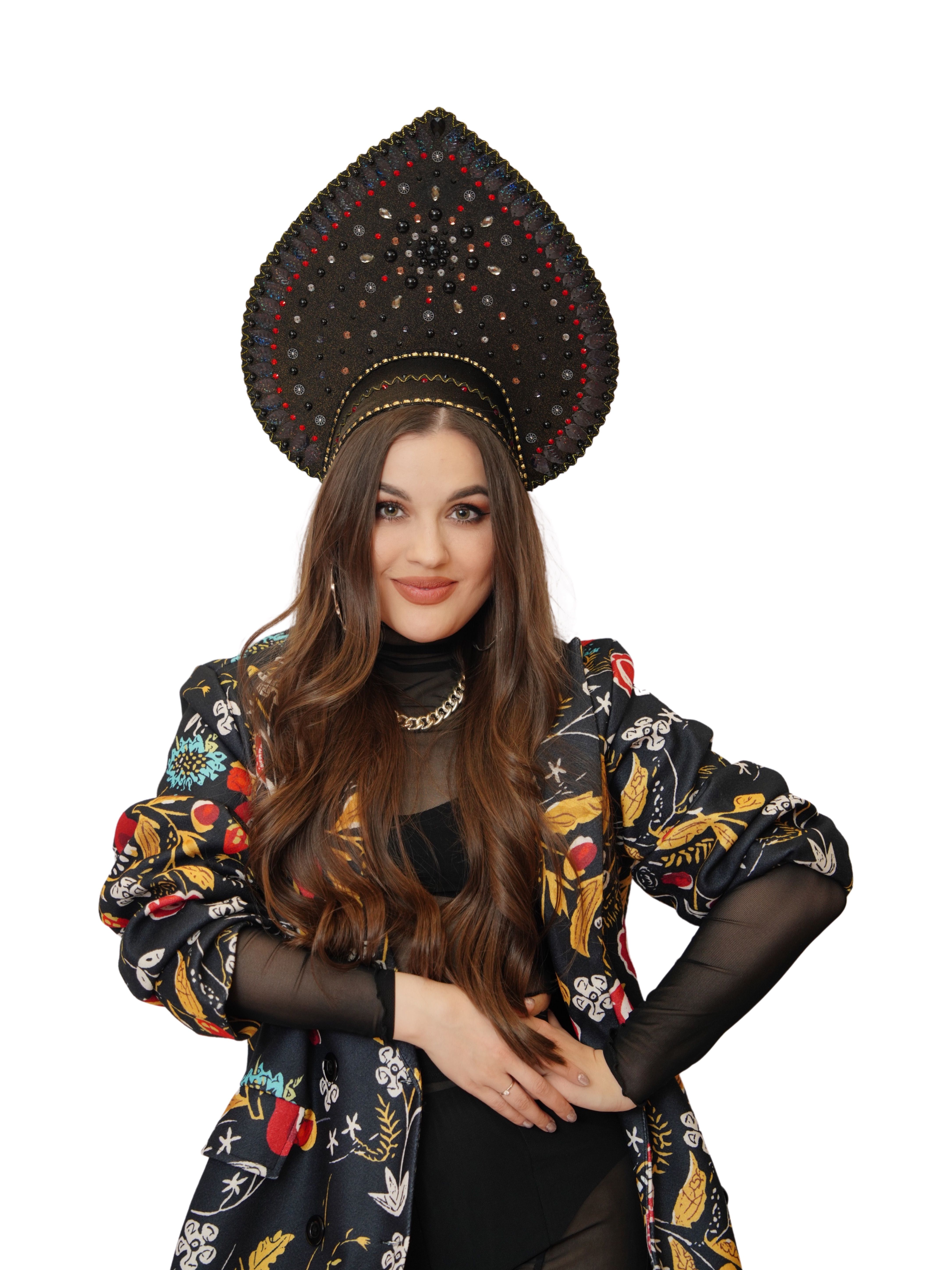 Portrait of a woman in a traditional Russian kokoshnik outfit on a white background.
