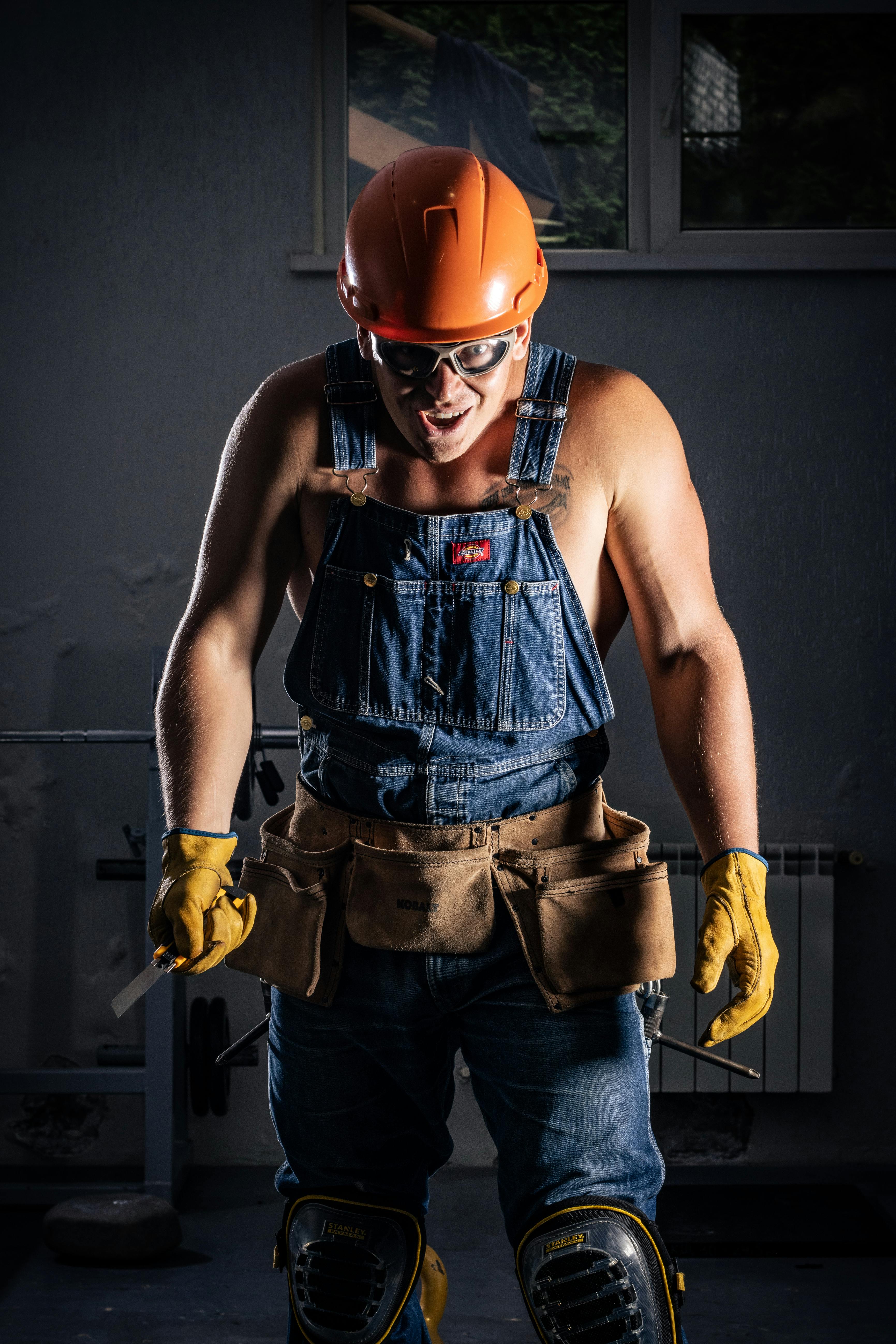 A Man in a Work Uniform · Free Stock Photo