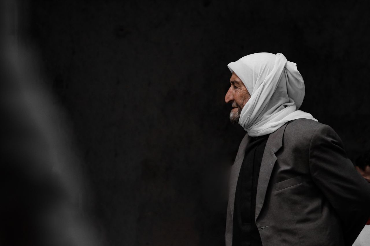 portrait of an elderly man in traditional attire from aleppo syria