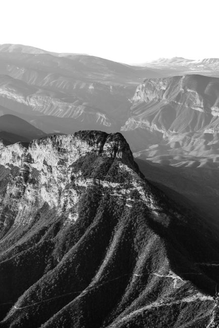 Stunning aerial view of Pinal de Amoles' mountainous landscape in black and white.