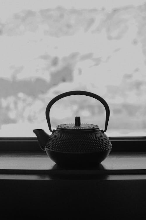 Black and White Photo of a Teapot 