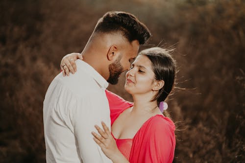 Couple Hugging and Smiling 