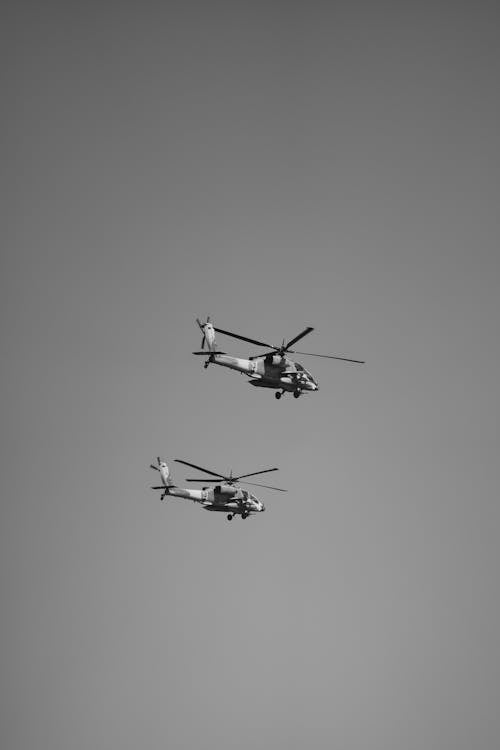 Helicopters on Sky in Black and White